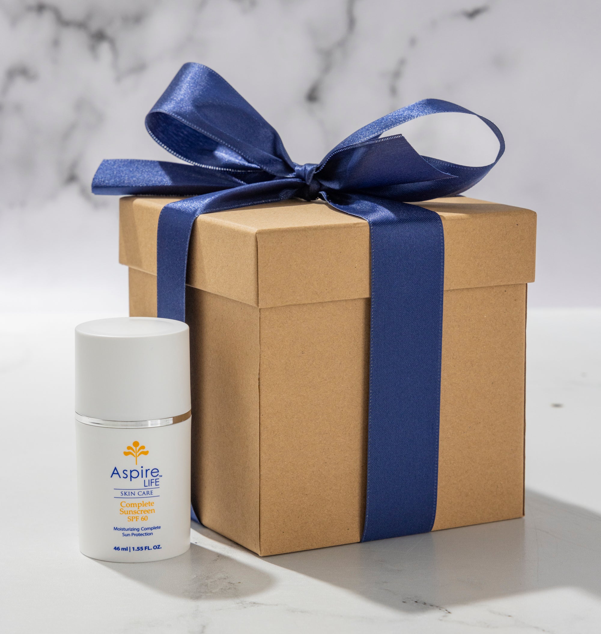 AspireLIFE® Complete Sunscreen SPF 60 – mineral broad spectrum sunscreen with non-nano zinc and titanium dioxide for sun and pollution protection.