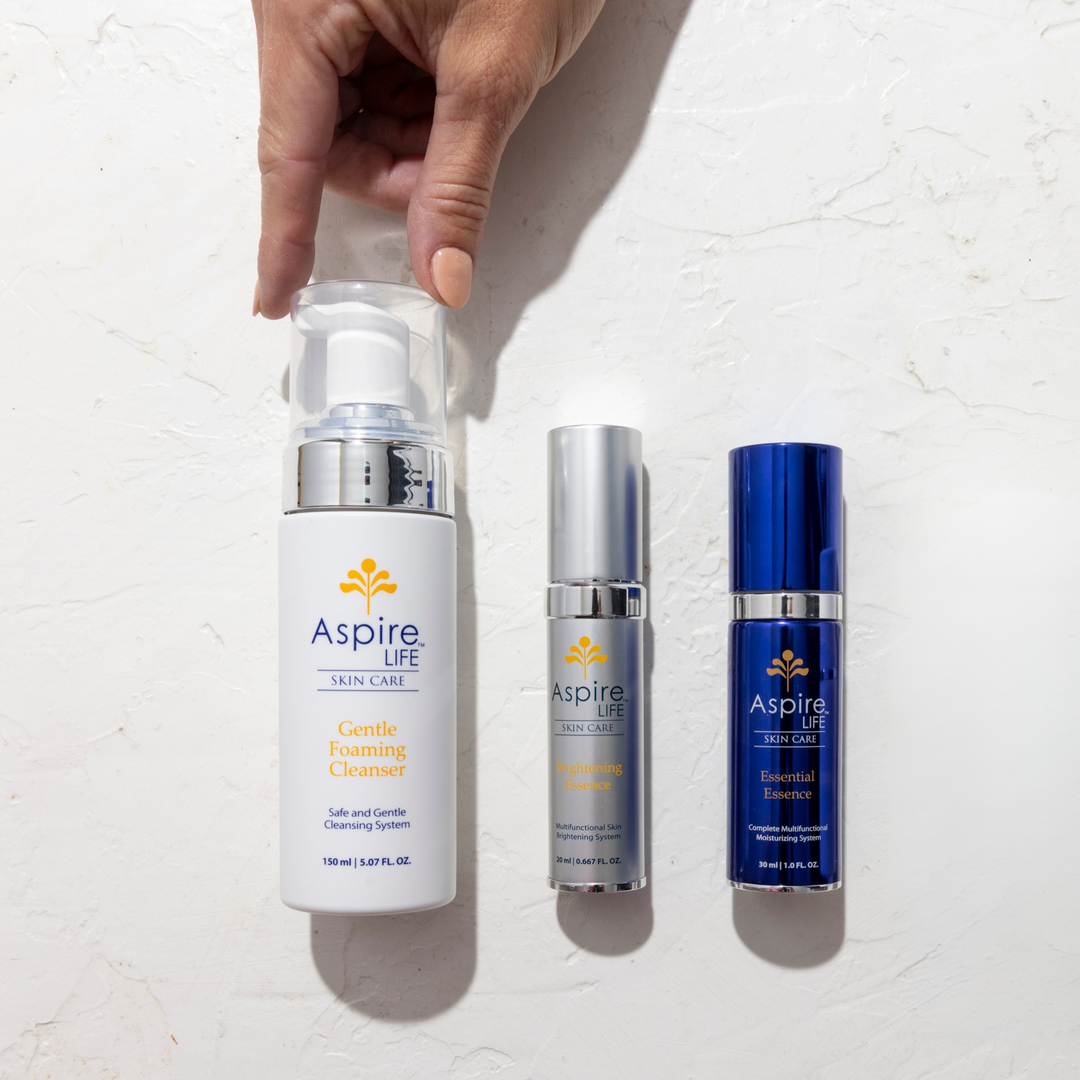 AspireLIFE® Balanced Glow Set featuring the Gentle Foaming Cleanser, Essential Essence, and Brightening Essence. A complete skincare routine designed to cleanse, hydrate, and brighten. Ideal for glowing, balanced skin with simplified skin care steps.