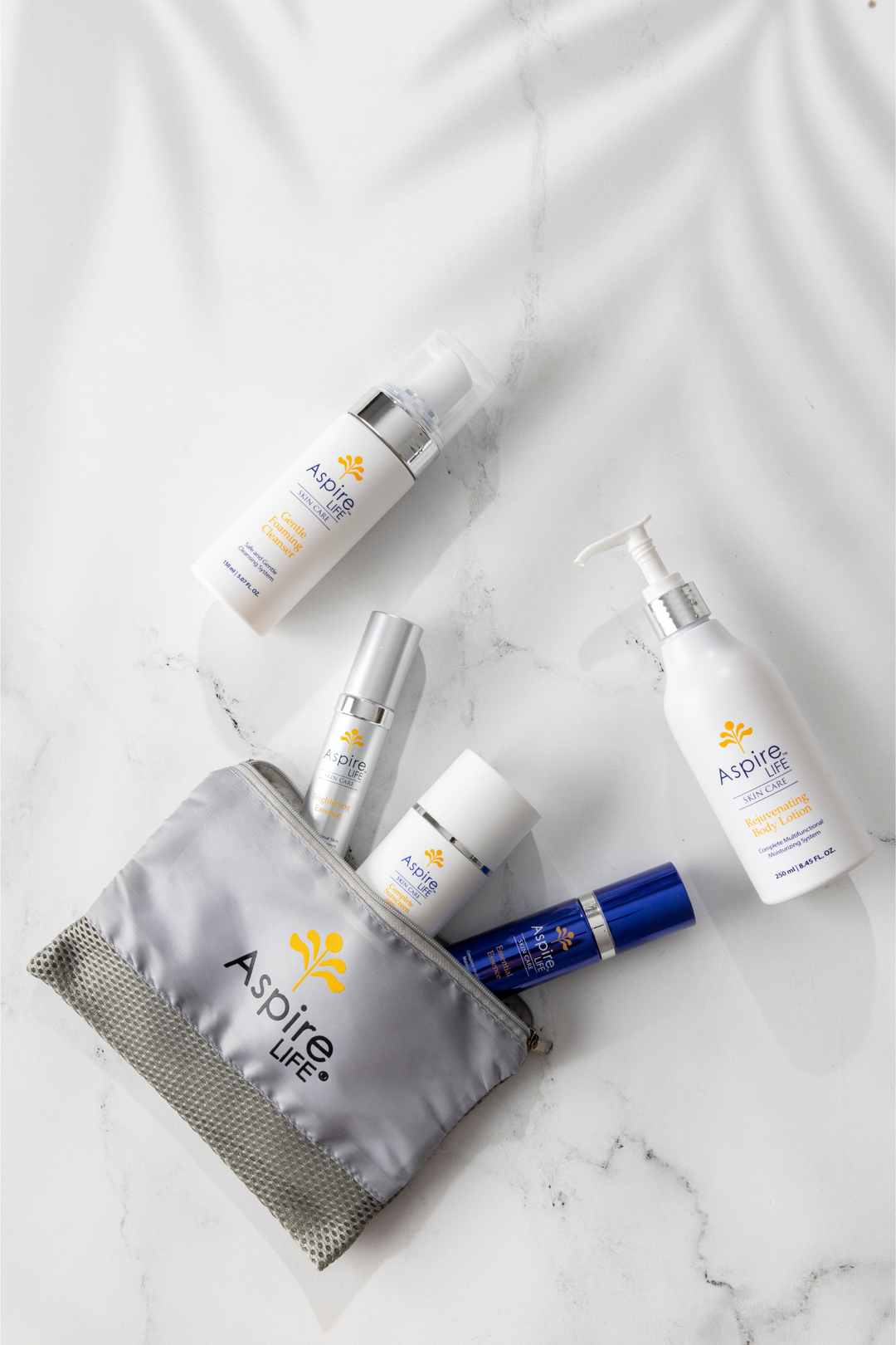 AspireLIFE® Complete Skincare Regimen – all-in-one system featuring cleanser, moisturizers, and SPF for complete skin wellness.