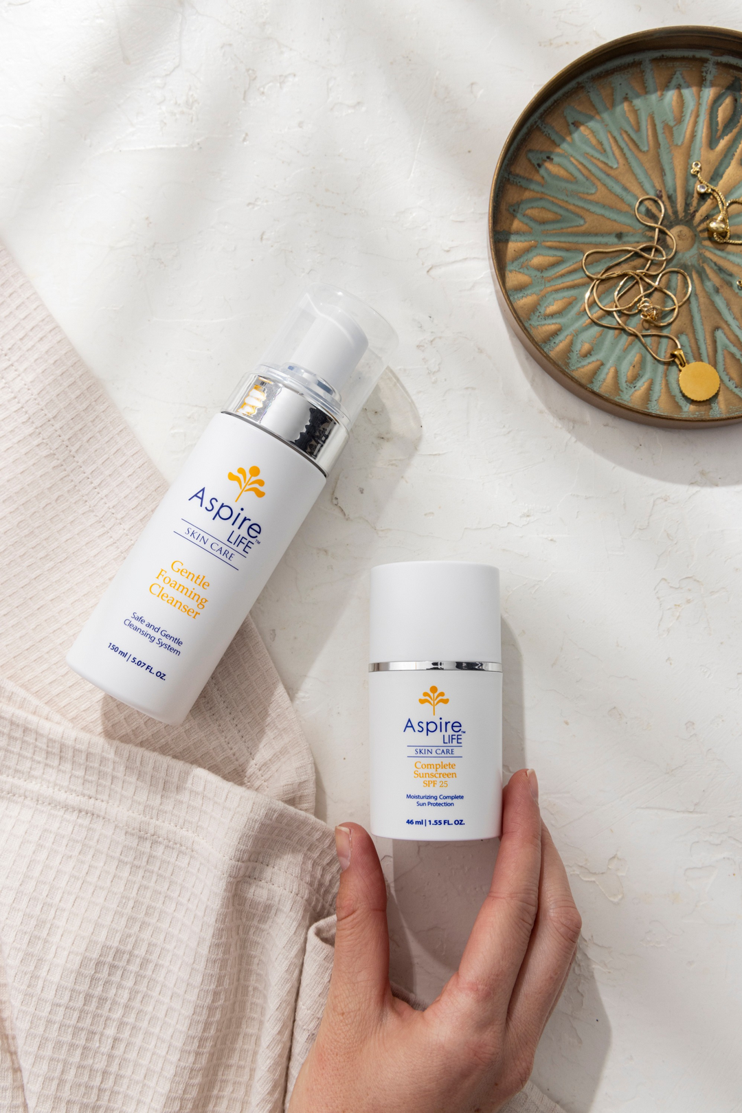 AspireLIFE® The Day Set – daily skincare trio including cleanser, and mineral SPF for morning hydration and protection.